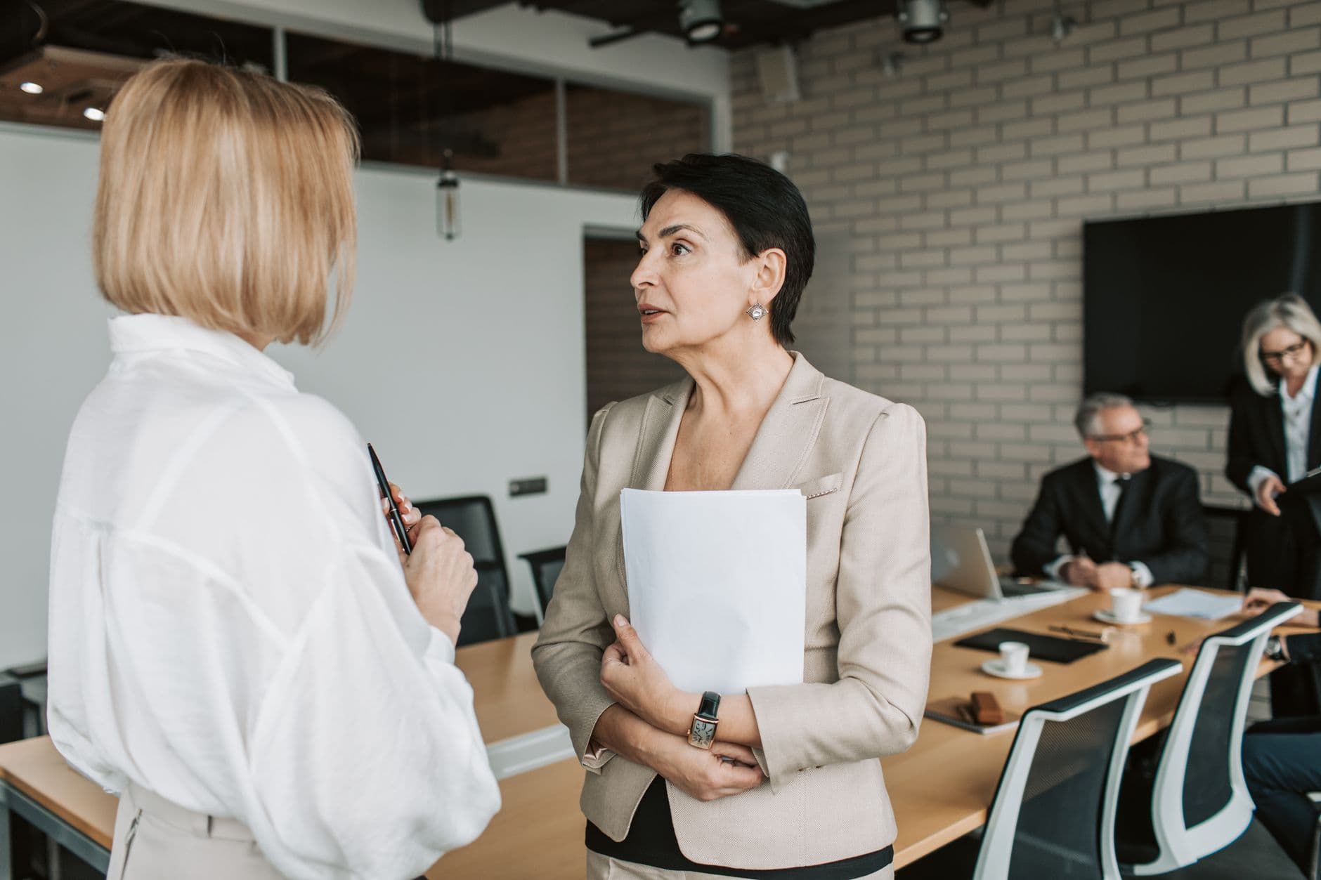 Coventra recruiters in conversation with a client